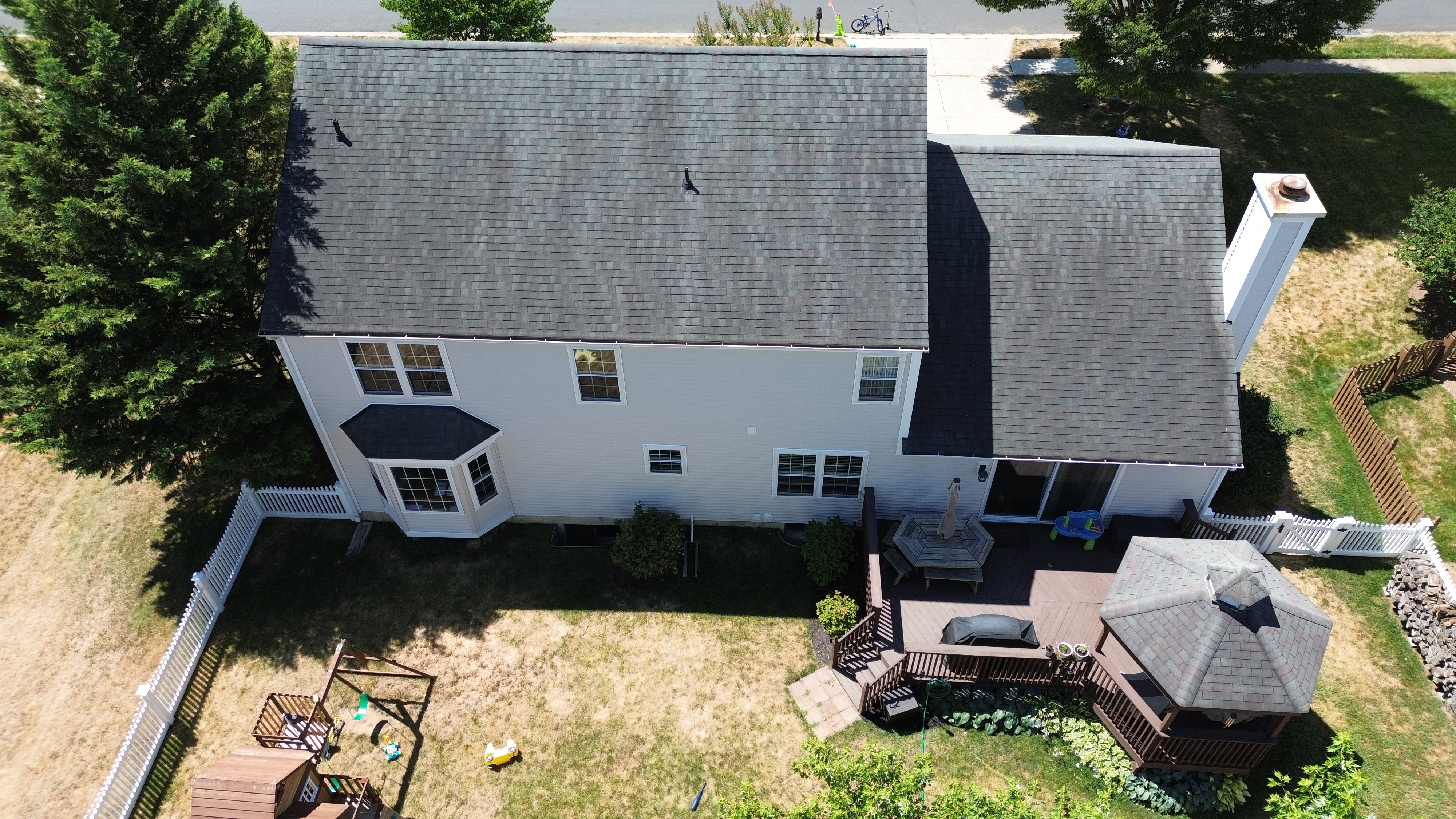 Finished siding replacement with crisp white trim on a Crofton Maryland home by Prime Roofing & Siding